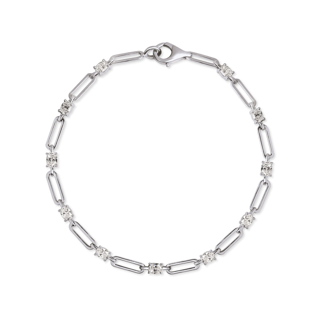 14K white gold diamond link bracelet featuring round brilliant diamonds and polished elongated chain links. Fine jewellery bracelet by Ocean Bleu Singapore.